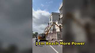 11m long reach boom with hydraulic breaker is working.
