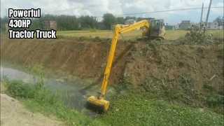 Excavator with long reach boom and Screening Bucket